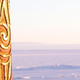 A Māori carving with the Ross Ice Shelf in the background.
